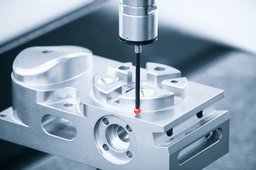 Operator inspection dimension metal parts by CMM after machining process in industrial factory.